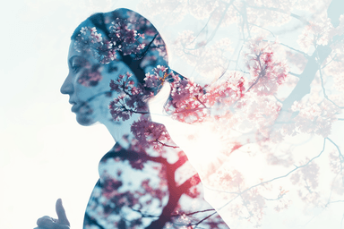 A person with a tree in the background