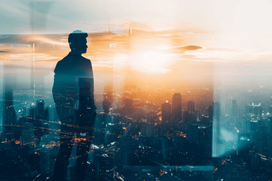 A man standing on top of a tall building