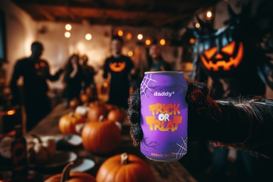 Hand Gripping Beer Can Mockup at Halloween Party