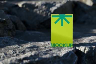 Vertical Poster Mockup on Giant Stone