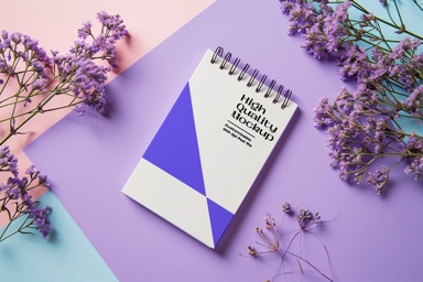 Customizable Notepad Mockup with Purple Flower