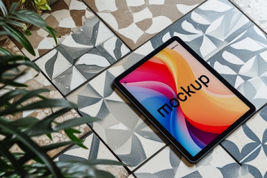 iPad Screen Mockup Laying on Floor Near Plants