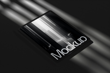 iPad Display Mockup Laying on Dark Surface in Sunlight
