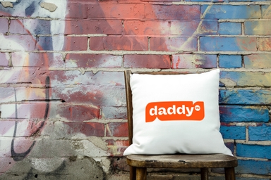 Cushion Mockup on Small Chair Against-Graffiti Wall