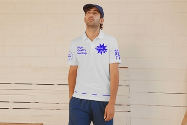 Man Presents Polo T-shirt Mockup with Blue Cap