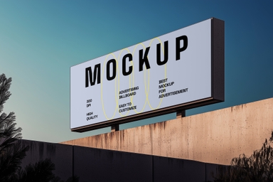 Billboard Mounted on Concrete Wall Against Sky