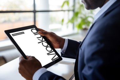 African American Business Man using iPad PSD Mockup
