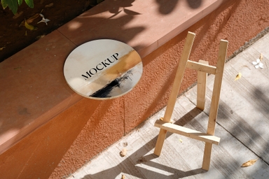 Round Canvas Mockup on Sandstone with Wooden Easel