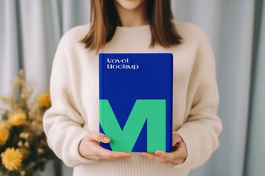 Woman Holding Novel Book Cover Mockup Front Side