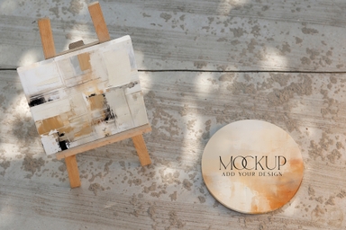 Square and Round Canvas Mockup on a Cement Floor