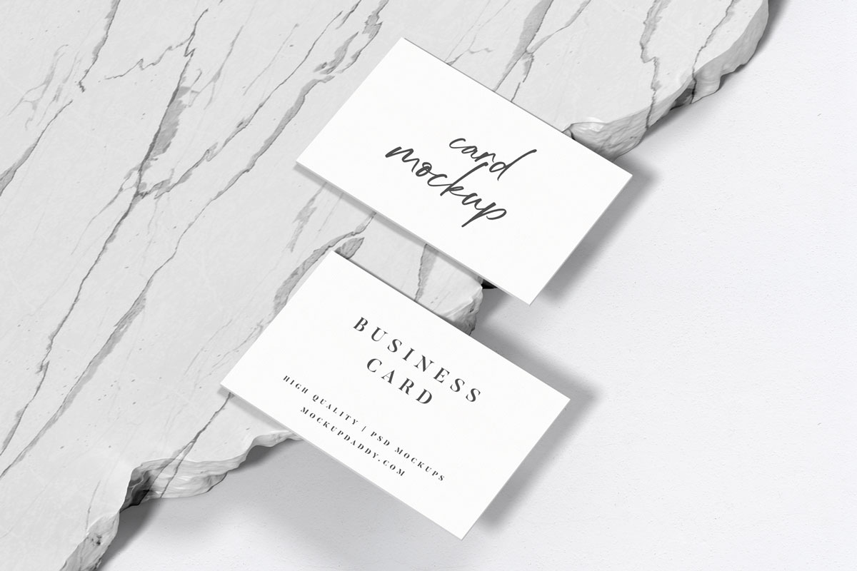 Black and white marble podium mockup with two business cards