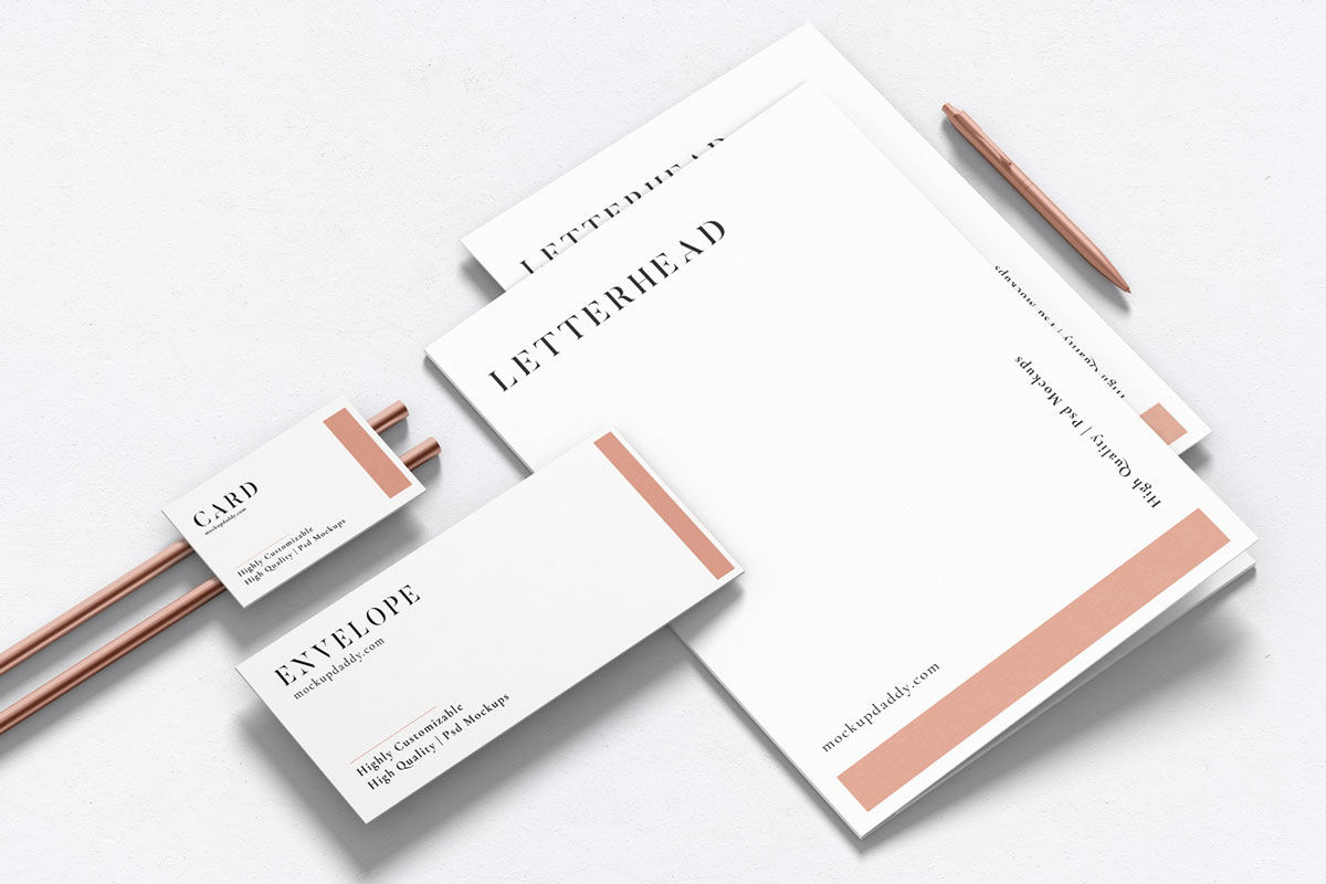 Black and white branding mockup with business card, letterhead, and envelope