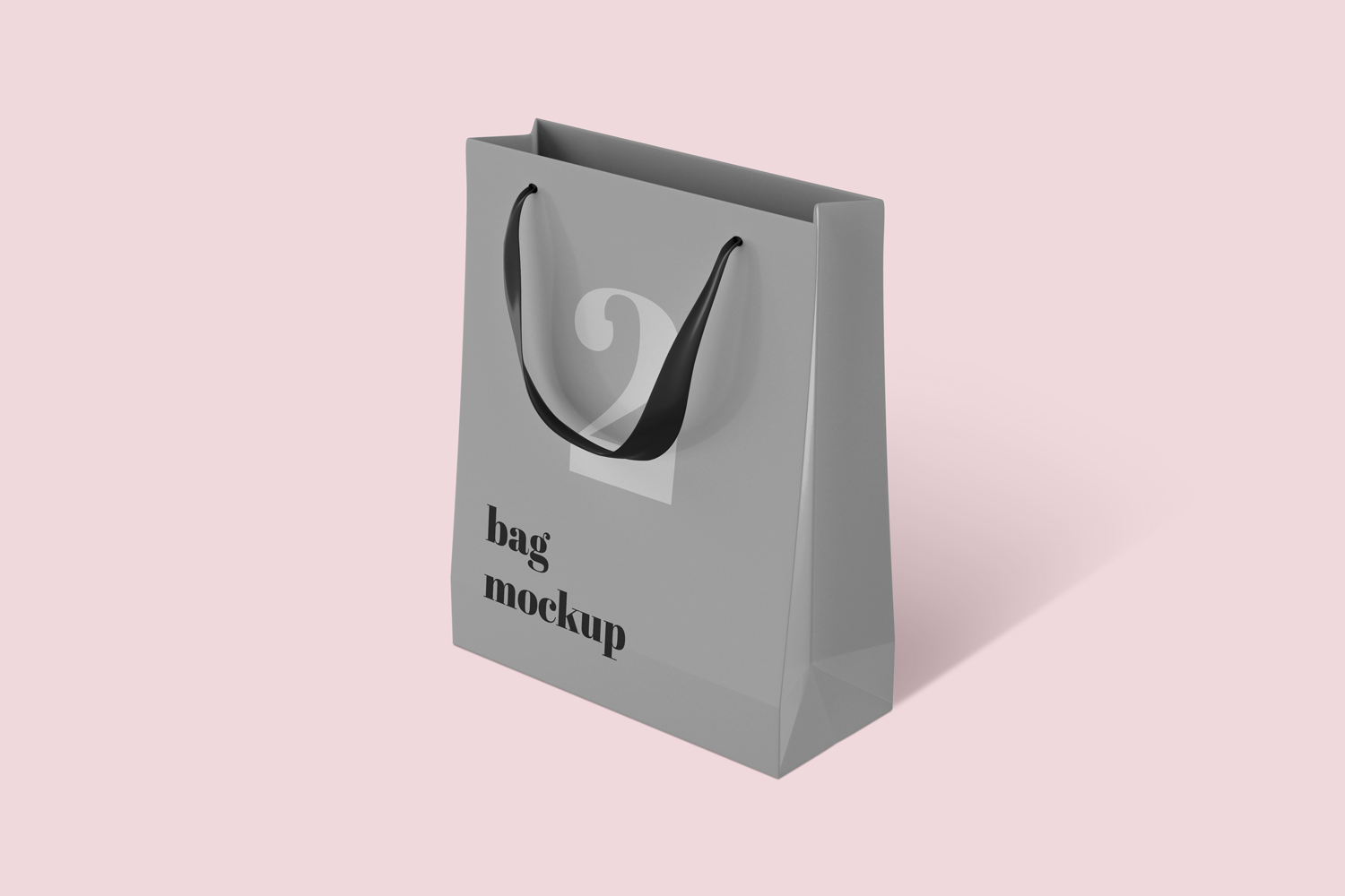 Grey shopping bag mockup with black handle on pink background.
