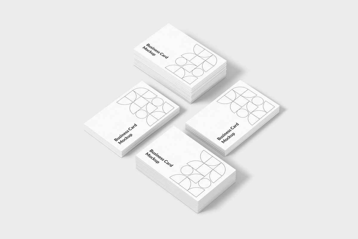 Three business cards with geometric patterns in a row.