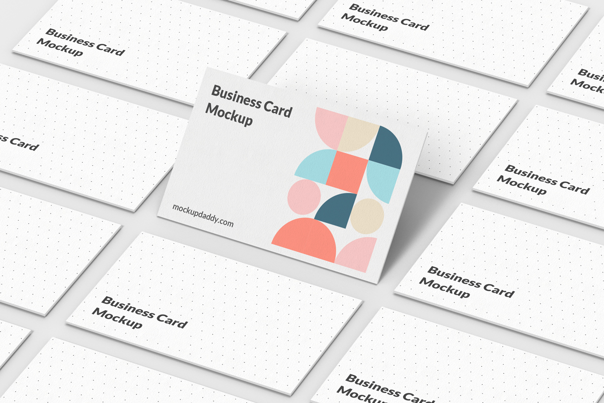 Stack of business cards with a colorful gradient design.