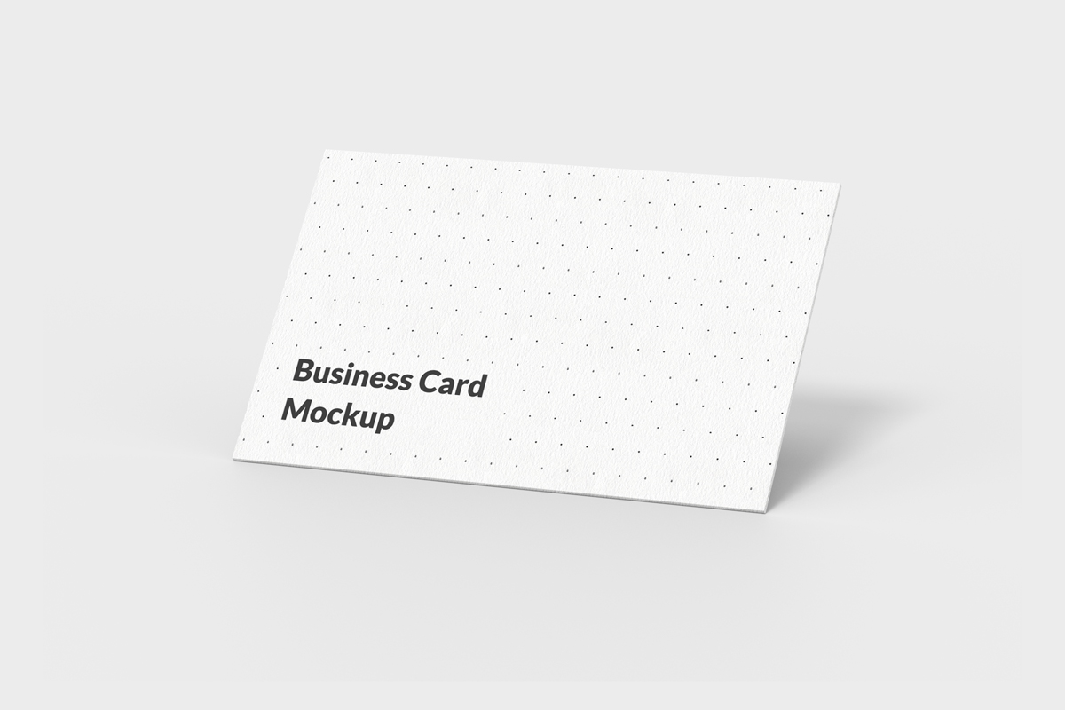 Close-up of two stacked business cards with a logo.