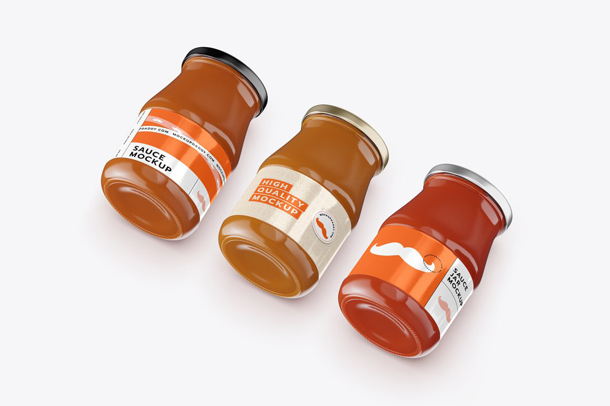 Three glass jars mockup with different labels on a white background