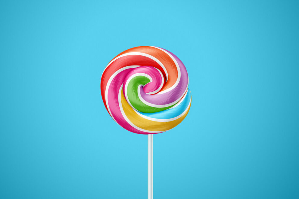 Multicolored candy swirl lollipop on white stick