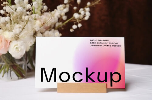 Card mockup by bouquet of flowers in background