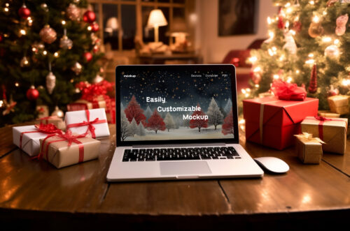 MacBook mockup on wooden desk with christmas gifts