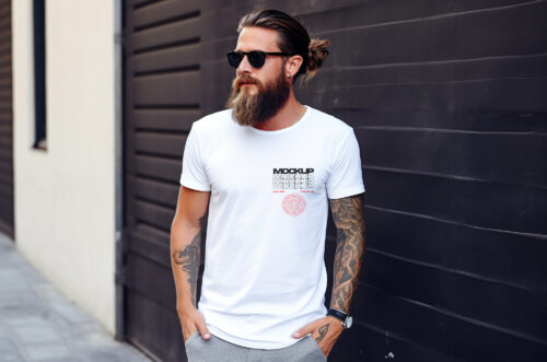 Bearded and tattooed man wearing t-shirt mockup-