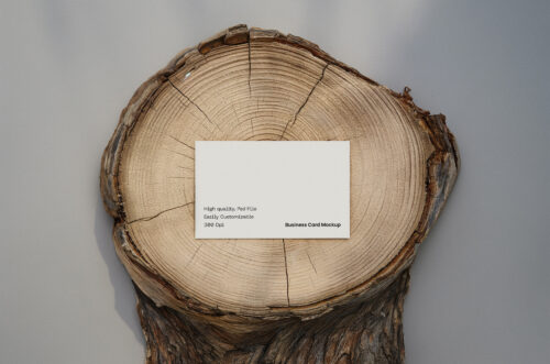 Business-card-mockup-on-wooden-log-