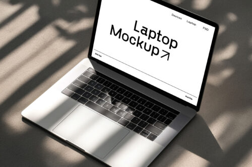 Laptop mockup on concrete floor-