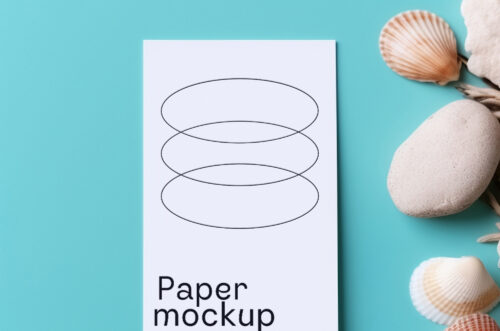 Paper mockup with sea stones-