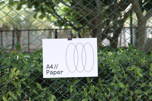 Free Download A4 horizontal paper mockup on wire mesh