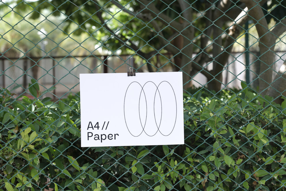 Free Download A4 horizontal paper mockup on wire mesh