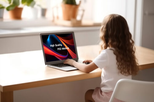 Free Download Little girl using MacBook mockup template
