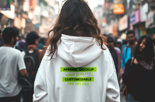 Woman's White Relaxed Fit Hoodie Mockup Standing in Crowded Street